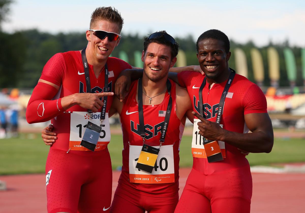 Three members of USA's athletics team - Jarryd Wallace, David Prince and Jerome Singleton - pose for a photo.