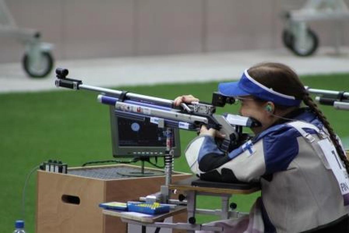 Minna Leinonen Shooting Women in a shooting range targeting