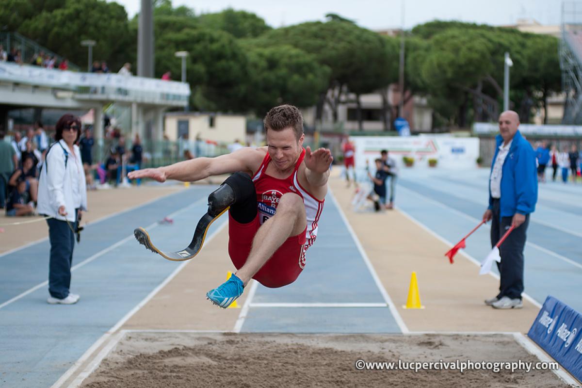 Markus Rehm Markus Rehm, single leg amputee extends his legs over the long jump pit