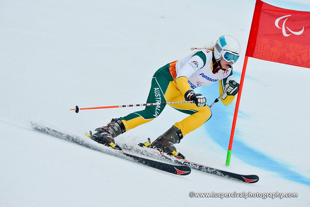 Jessica Gallagher - Sochi 2014 Winter Paralympic Games Jessica Gallagher, Australia edges show as she carves the corner into thrid place.