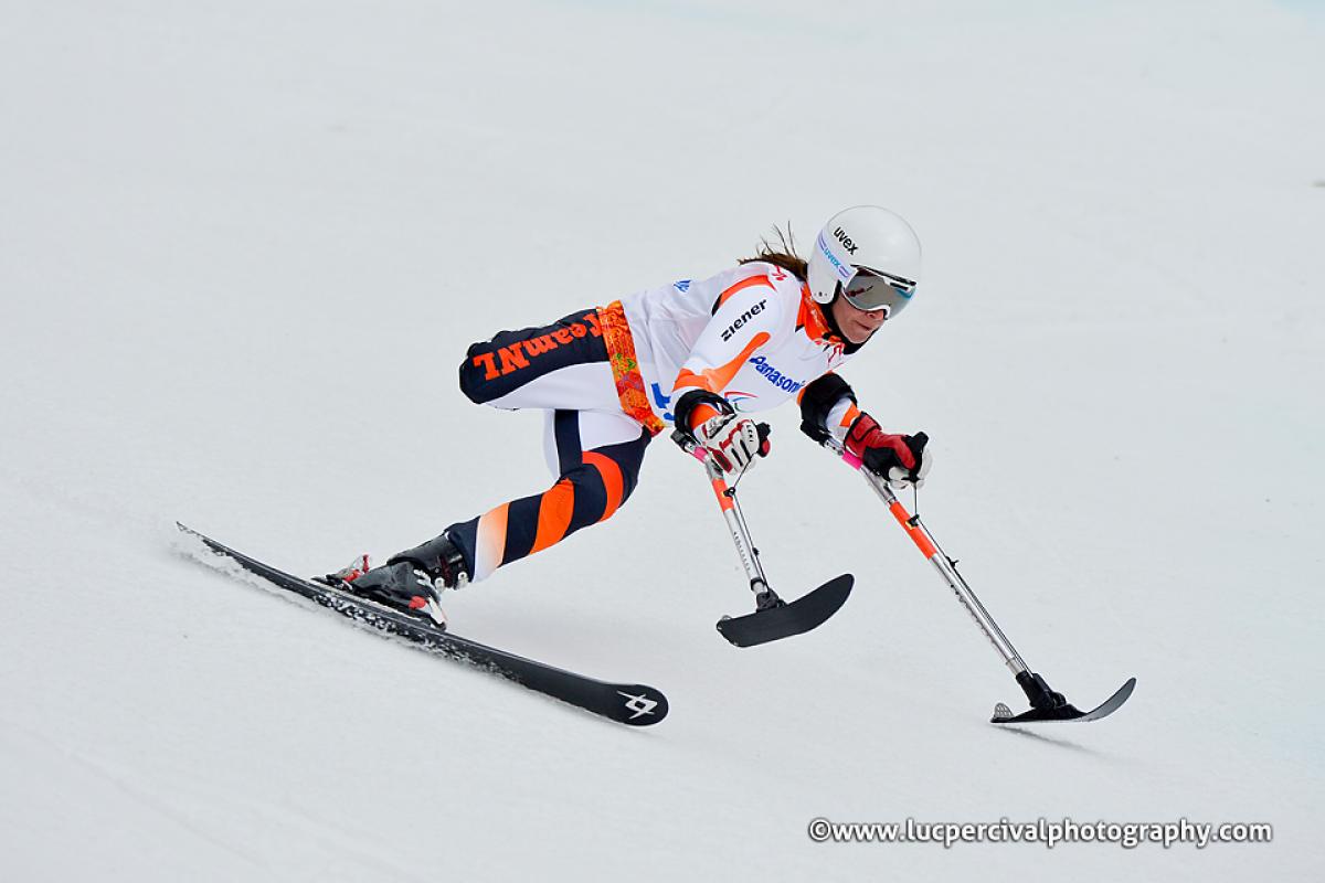 One-legged skier going down the slope.