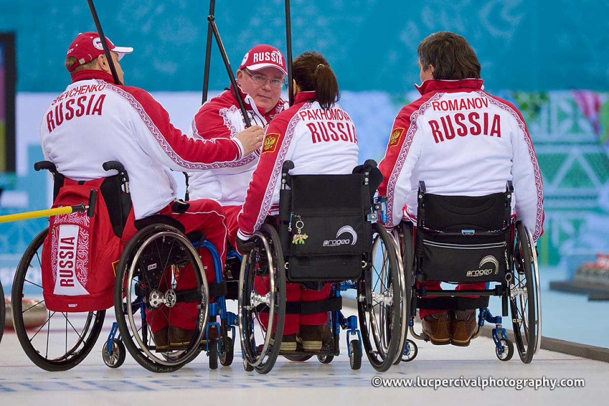 Wheelchair Curling - Sochi 2014 Paralympic Winter Games Wheelchair Curling Semi-final (RUS vs GBR) Team Russia group huddle