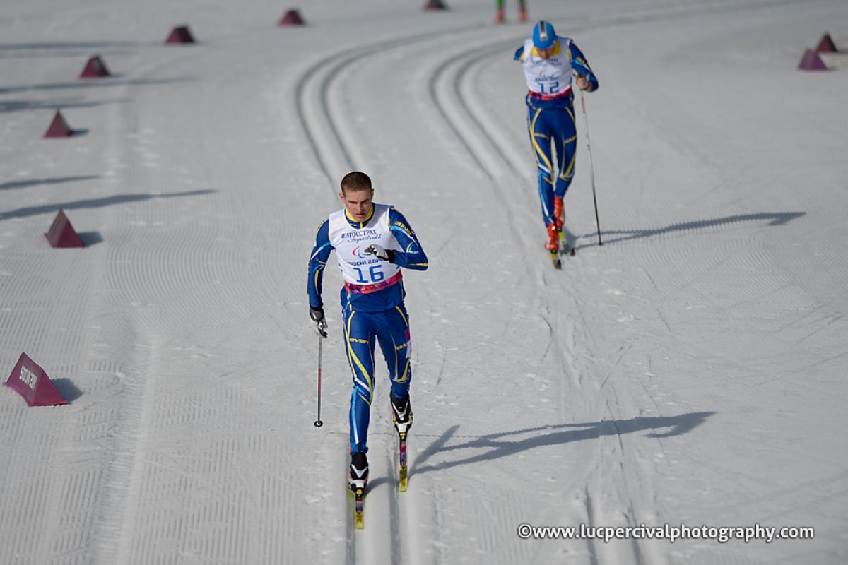 Ihor Reptyukh - Sochi 2014 Paralympic Winter Games Ukrainian Ihor Reptyukh skis at Sochi 2014 followed closely by a competitor