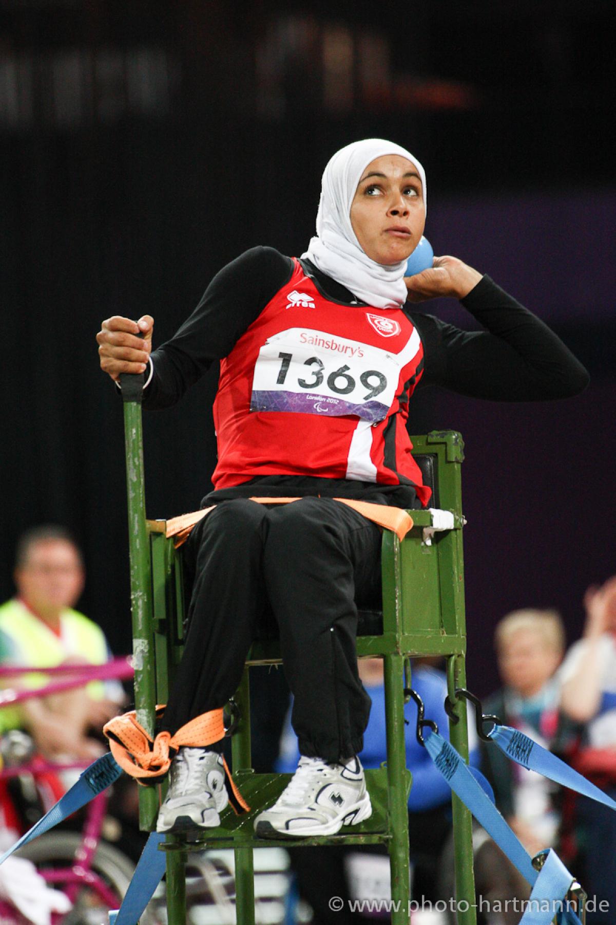Maroua IBRAHMI - Athletics - London 2012 Paralympic Games Women with headscarf doing shot put (sitting)