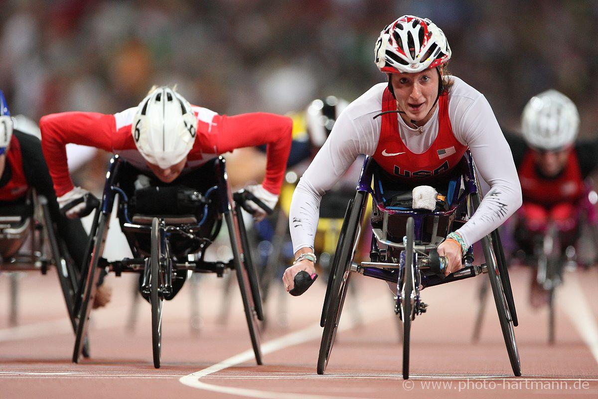 Wheelchair racers on the track of a stadium