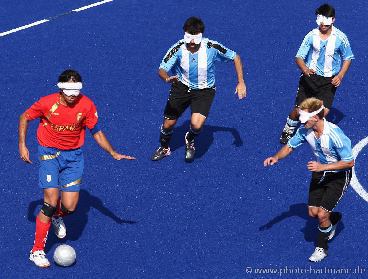Adolfo Acosta Rodriguez of Spain goes up against three Argentina defenders at the London 2012 Paralympic Games