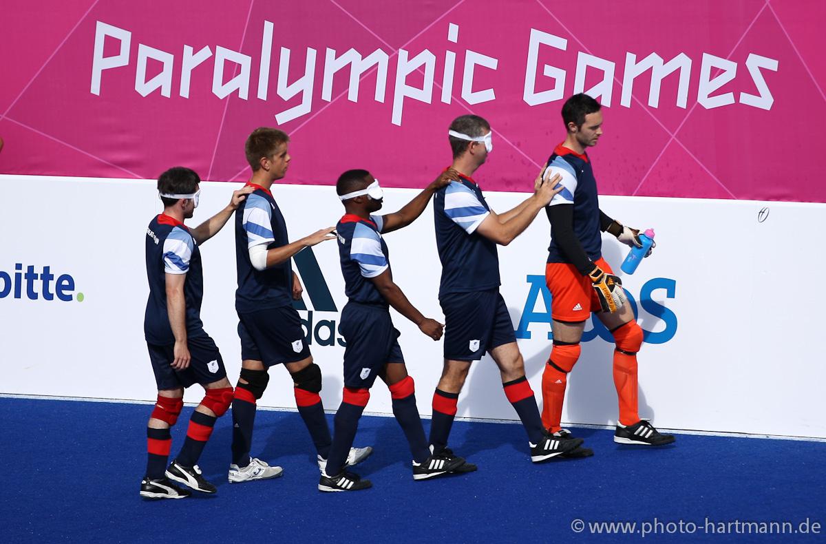 Team Great Britain marching onto the field led by their goalkeeper in the Football 5-a-side during the London 2012 Paralympic Games.