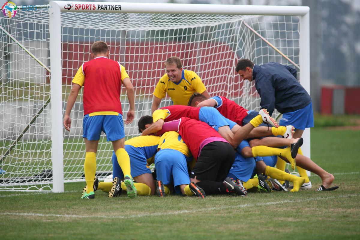 Ukraine celebrate victory at the 2014 CPISRA European Championships in Maia, Portugal.