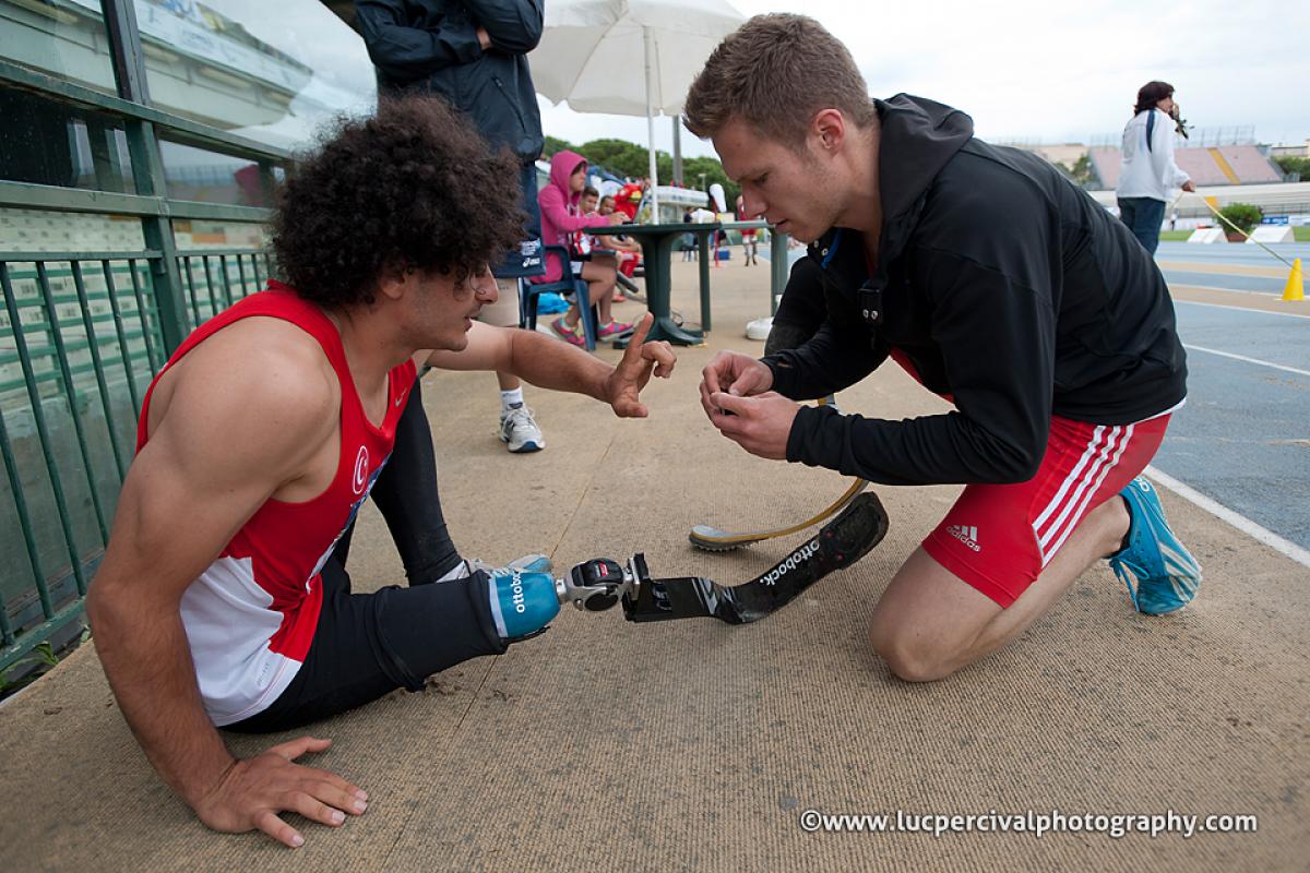 Markus Rehm Sportsmanship Germany's Rehm shows sportsmanship in fixing Turkey's Baris Telli's prosthetic to allow him to perform better