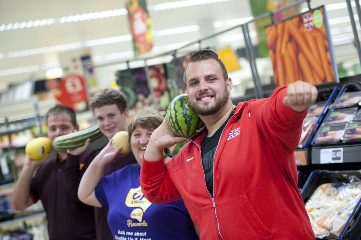 Aled Sion Davies, Nathan Stephens and Kryon Duke at local supermarket in Swansea