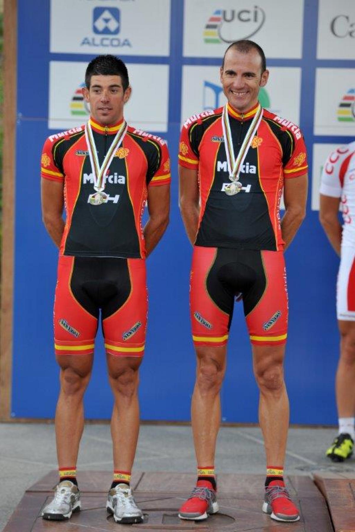 Ignacio Avila and Jose Font Two men stand on a podium with their medals