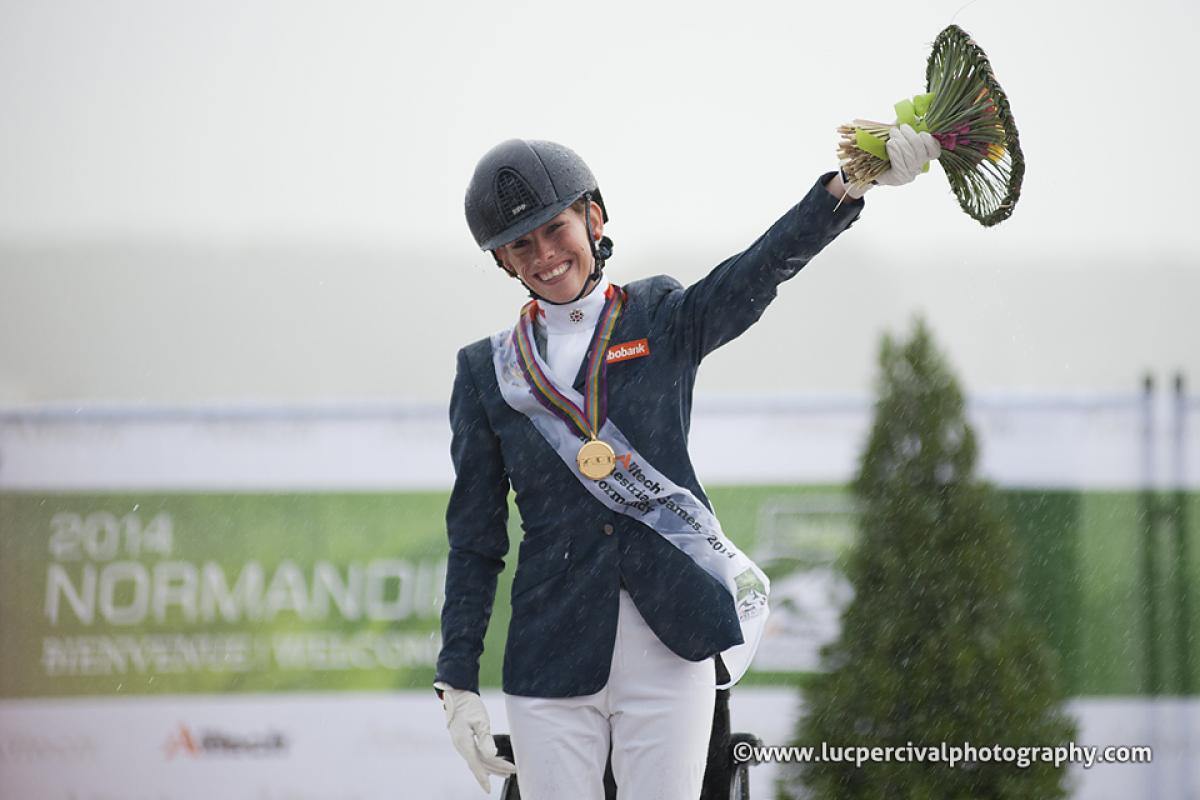 A delighted Rixt van der Horst of Denmark celebrates winning gold at the Alltech FEI World Equestrian Games.