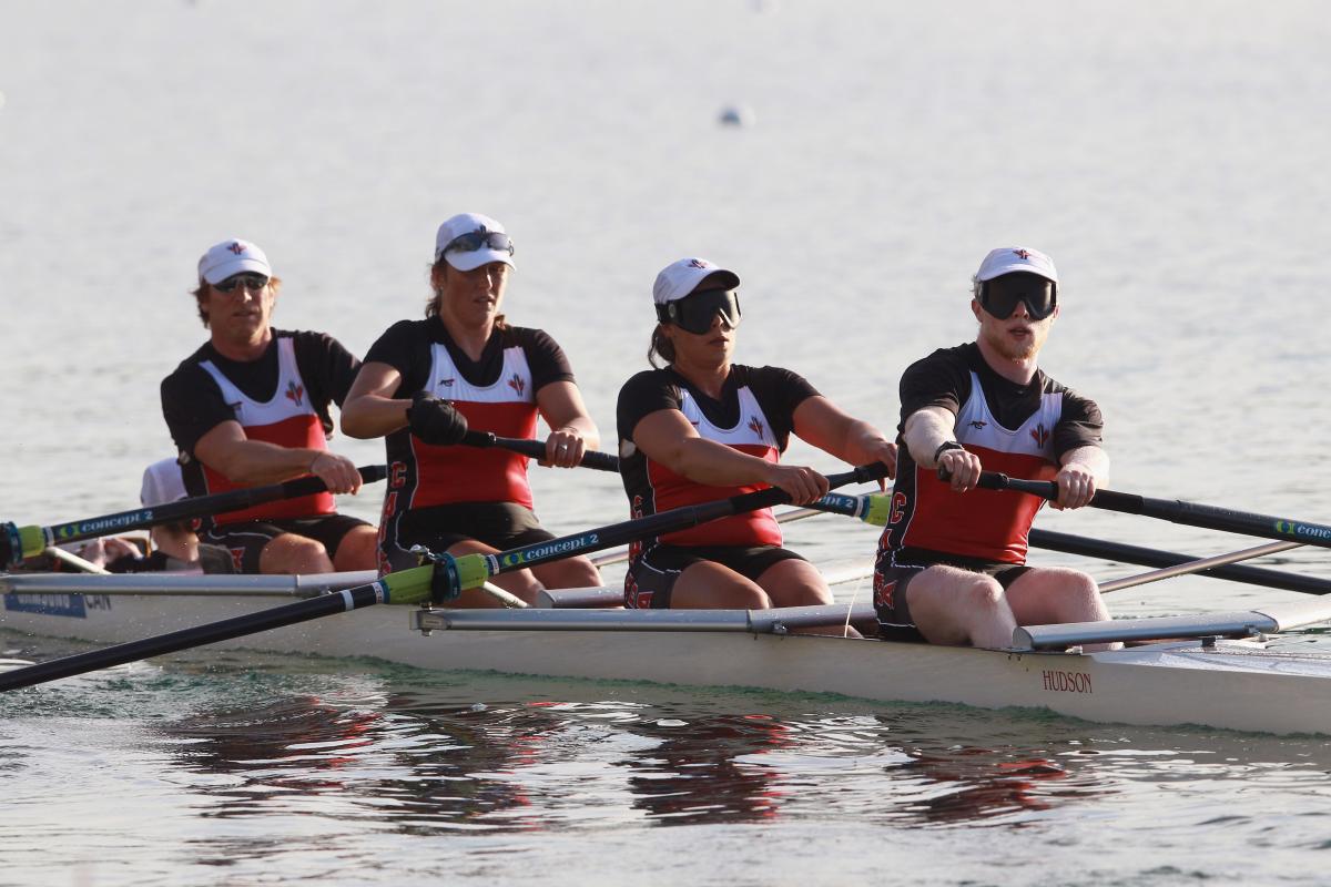 Four rowers in a boat