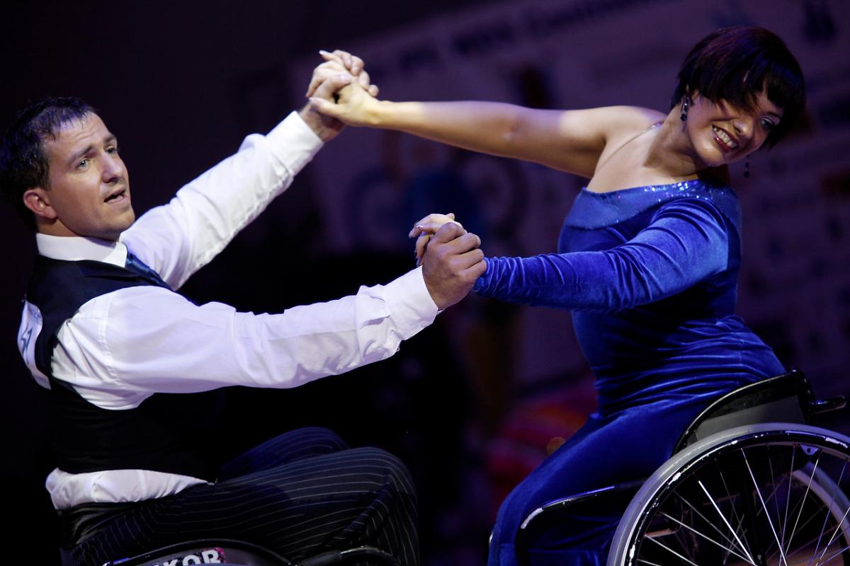 two wheelchair dancers in action