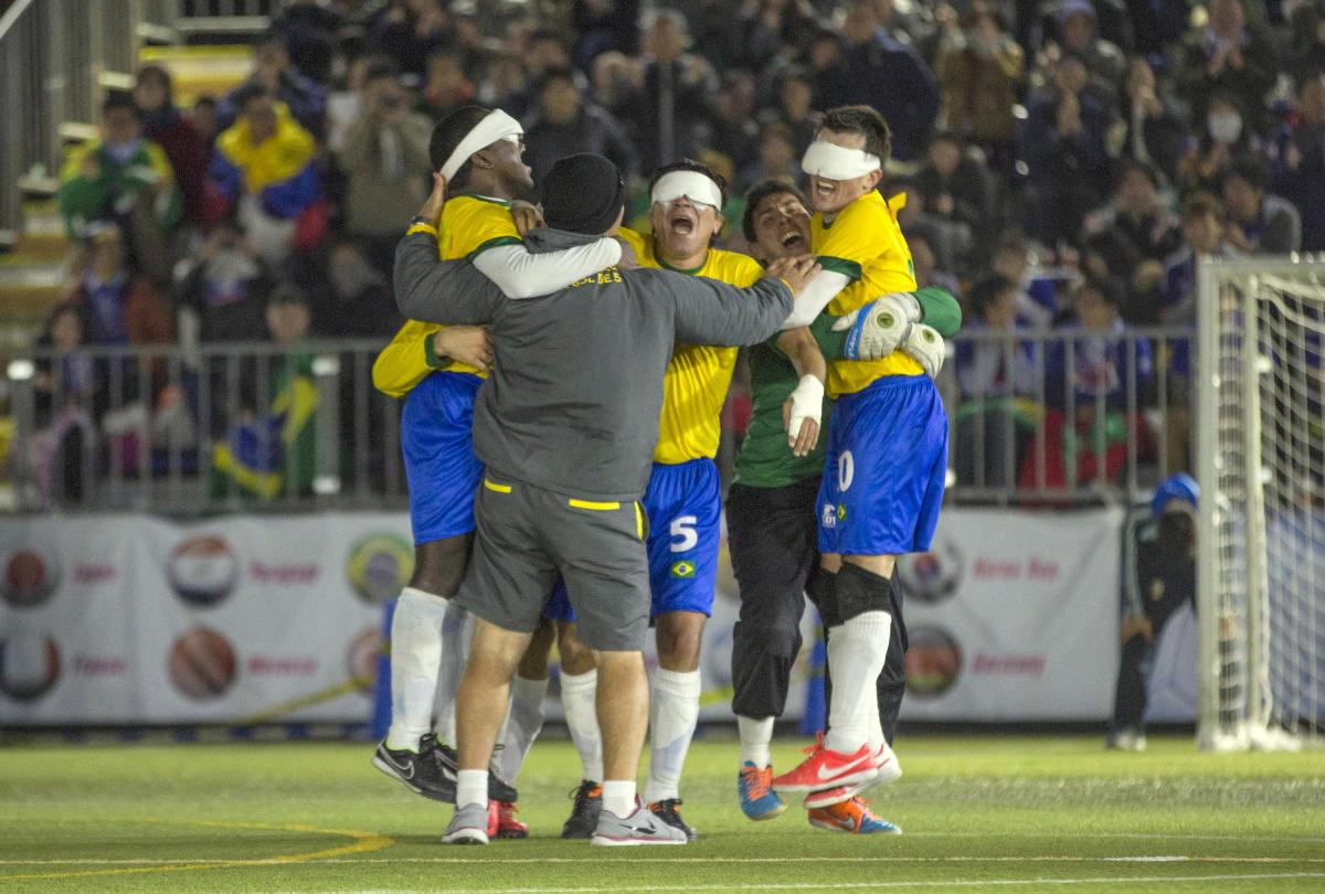 Brazil wins the IBSA Blind Football 5-a-side World Championships Blindefolded football team celebrating