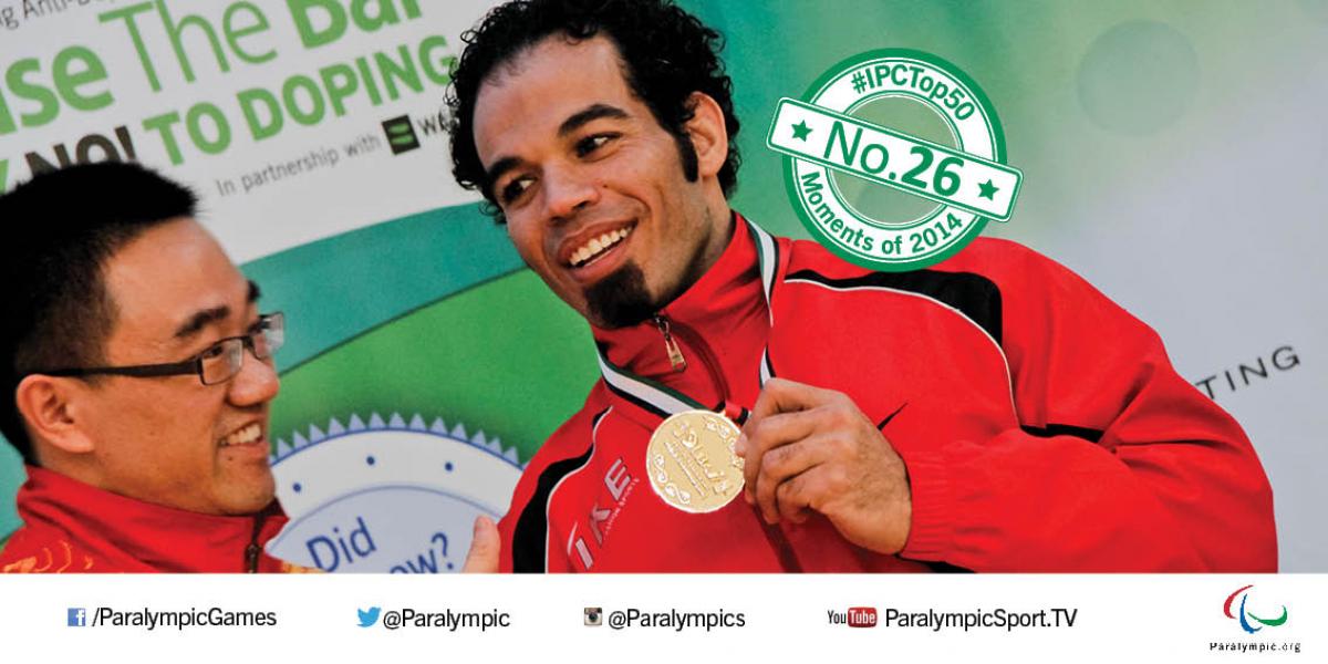 Sherif Osman Sherif Osman holds up his gold medal smiling