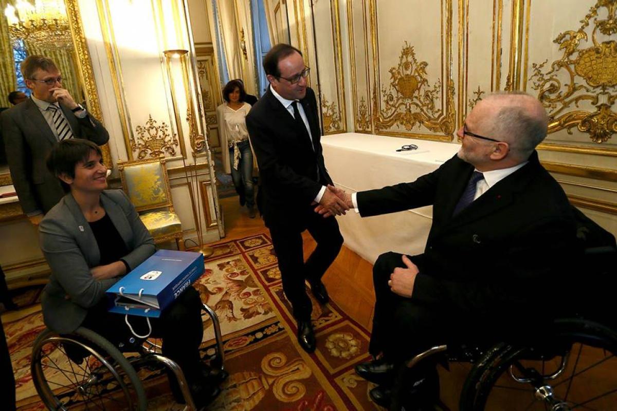 IPC President Sir Philip Craven and French NPC President Emmanuelle Assmann meet President Hollande of France.