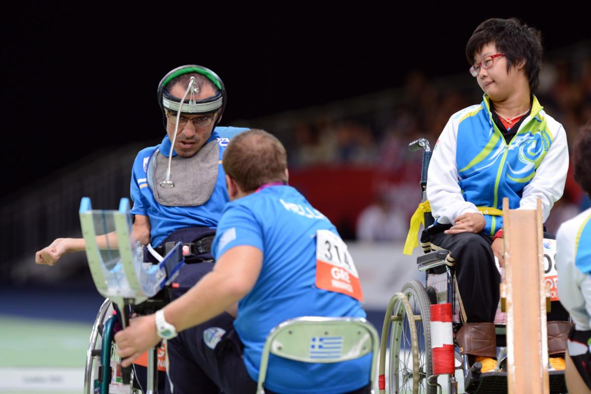 Two men in wheelchairs