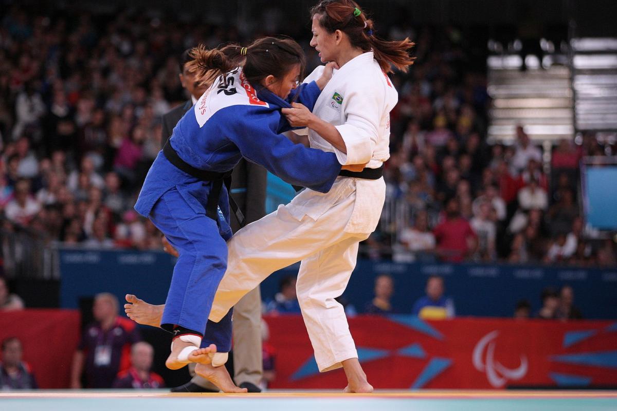 Two female judoka's fighting at the London 2012 Paralympics