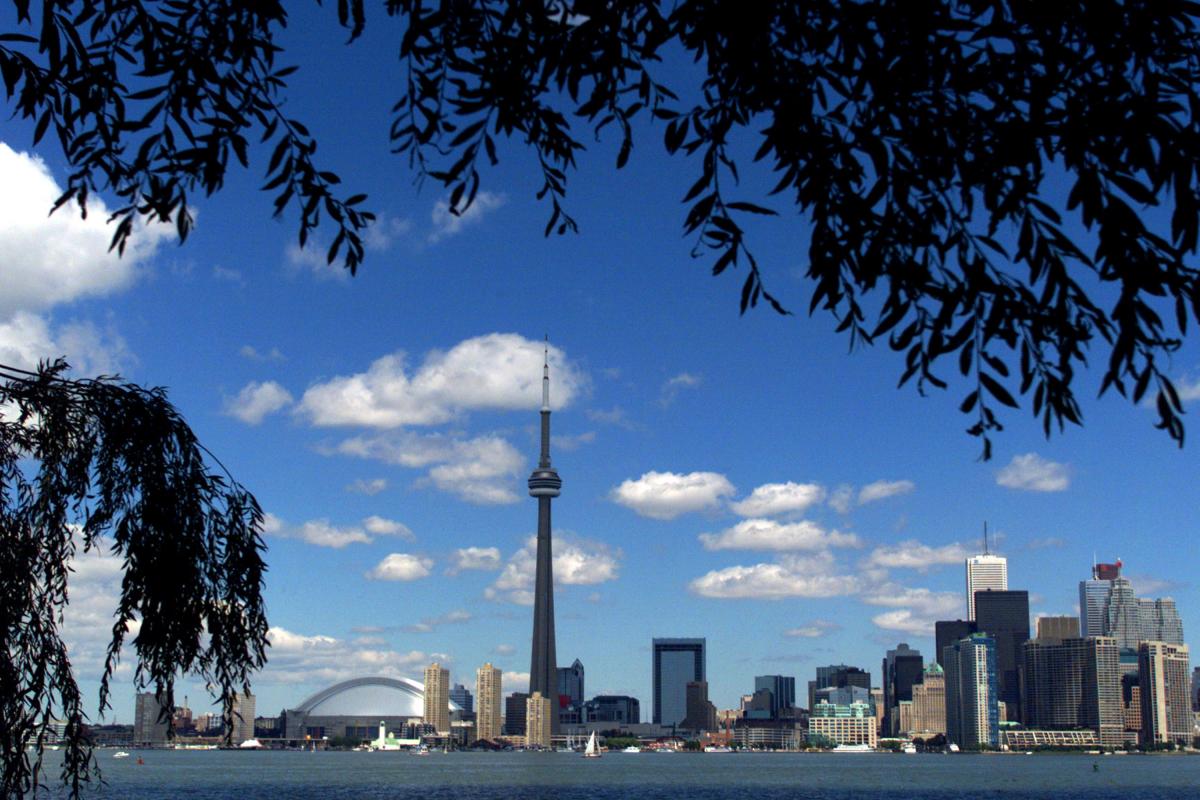 Toronto A view of the skyline of Toronto featuring tall buildings and the CN Tower.