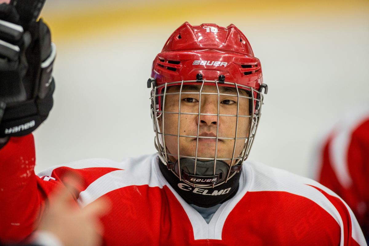 KOR-SWE Young-Jae Cho, South Korea, IPC Ice Sledge Hockey World Championships B-Pool 2015 Man with helmet and red jersey