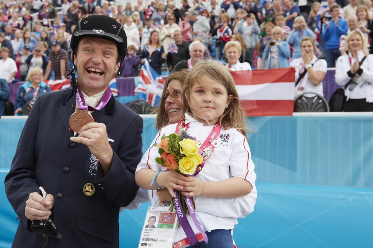 Pepo Puch pictured with his wife and daughter after medalling at the London 2012 Paralympic Games.  