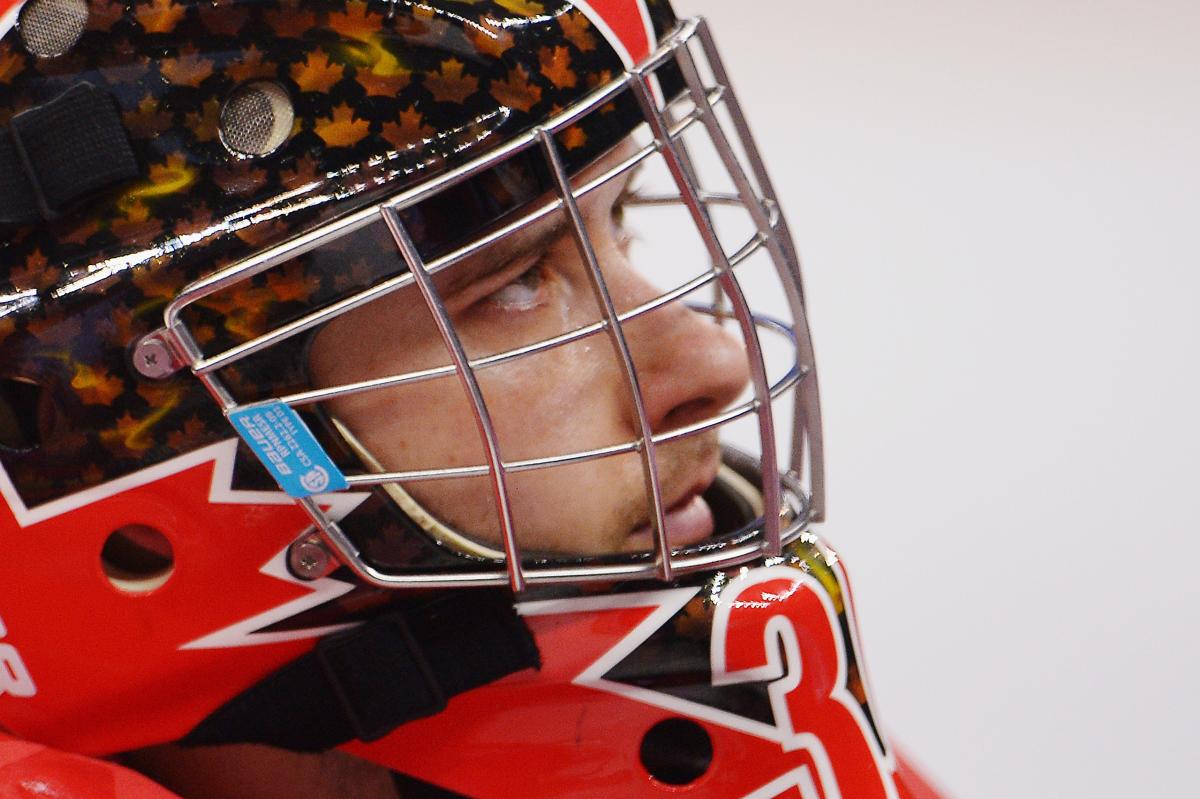 Goalkeeper Corbin Watson of Canada looks dejected after the Ice Sledge Hockey Play-off semi final between Canada and the United States of America at the Sochi 2014 Winter Paralympic Games.