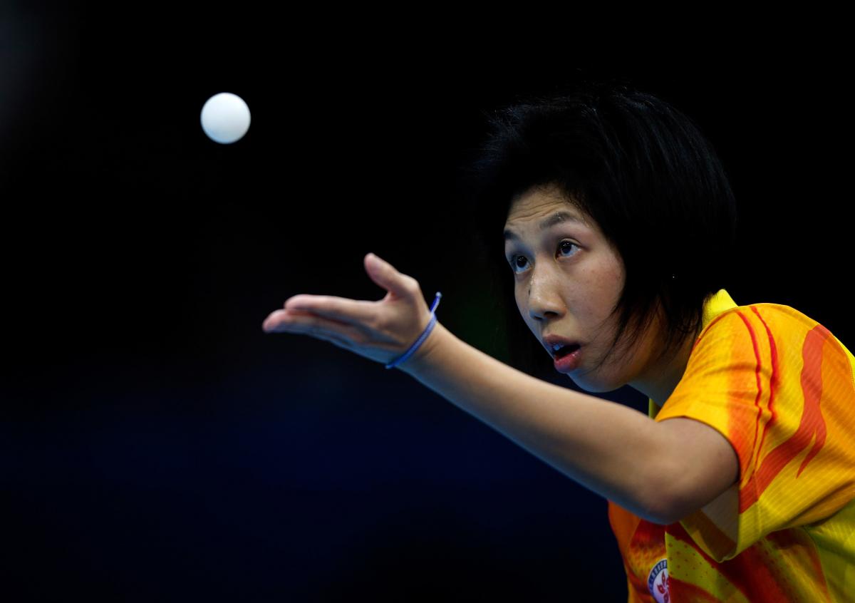 Ka Man Wong of Hong Kong Ka Man Wong of Hong Kong serves during her Women's singles Gold medal match against Chi Ka Yeung of Hong Kong at the London 2012 Paralympic Games.