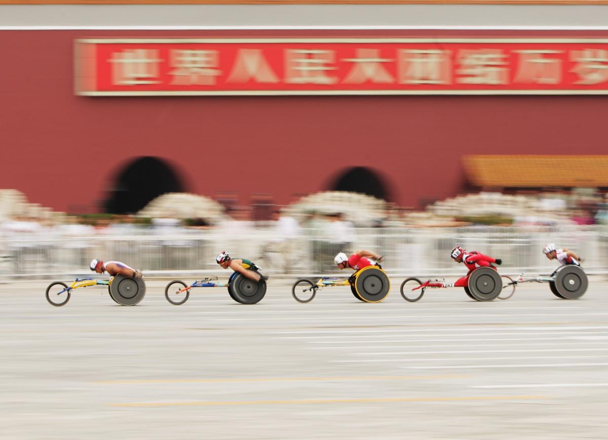 Beijing The lead group of the marathon goes past the Forbidden City at Tiananmen Square at the Beijing 2008 Paralympic Games.