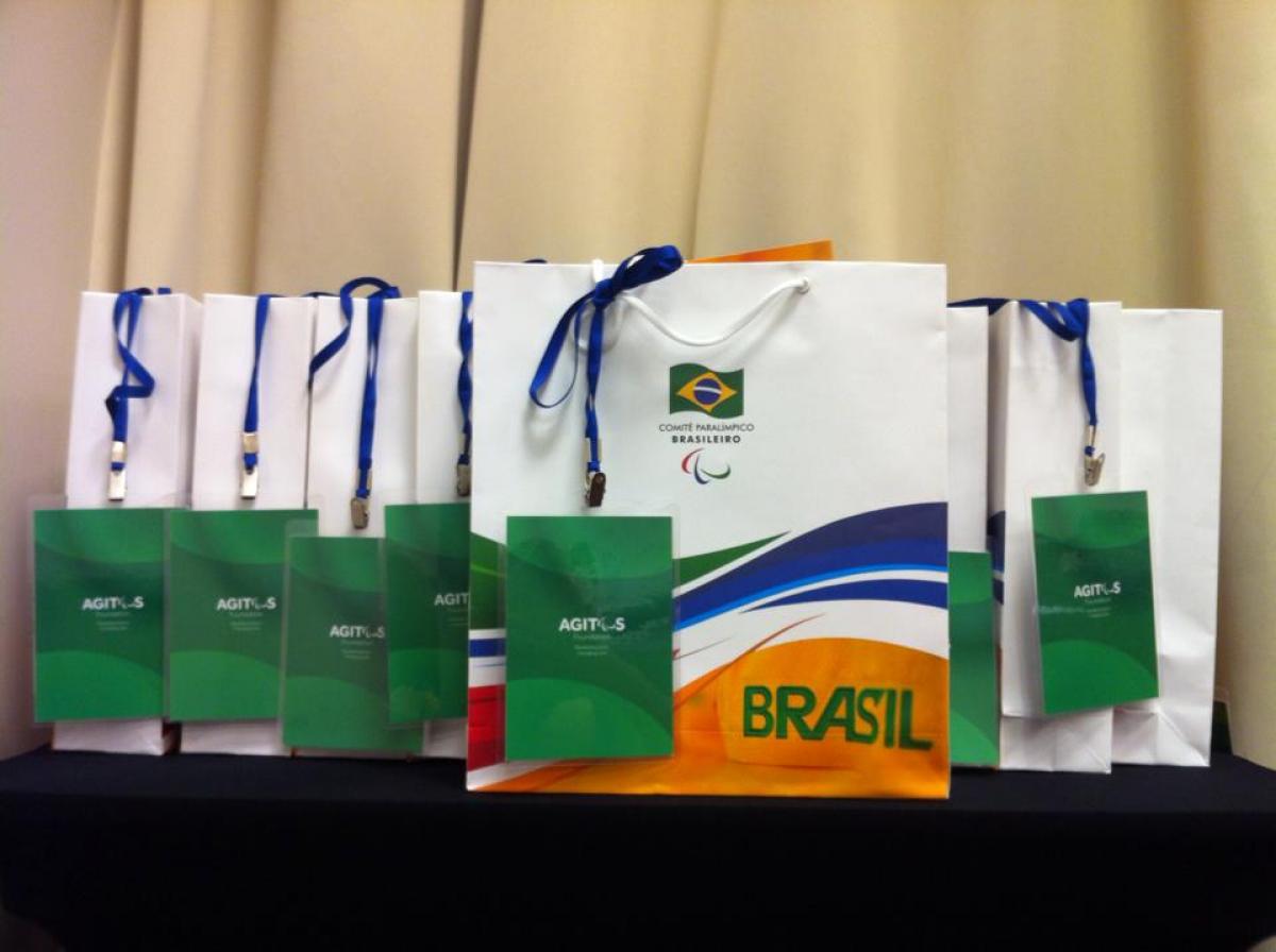 Agitos Foundation Road to Rio 2016 workshop Bags with logos on a table