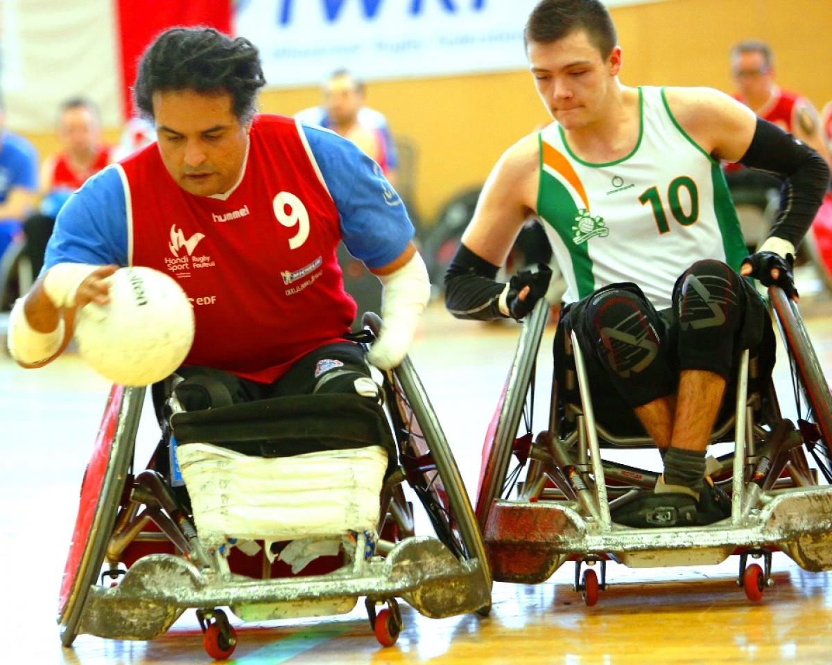 Ireland's Thomas Moylan (10) challenges France's Ryadh Sallem (9) during the IWRF Europe Division B final. 