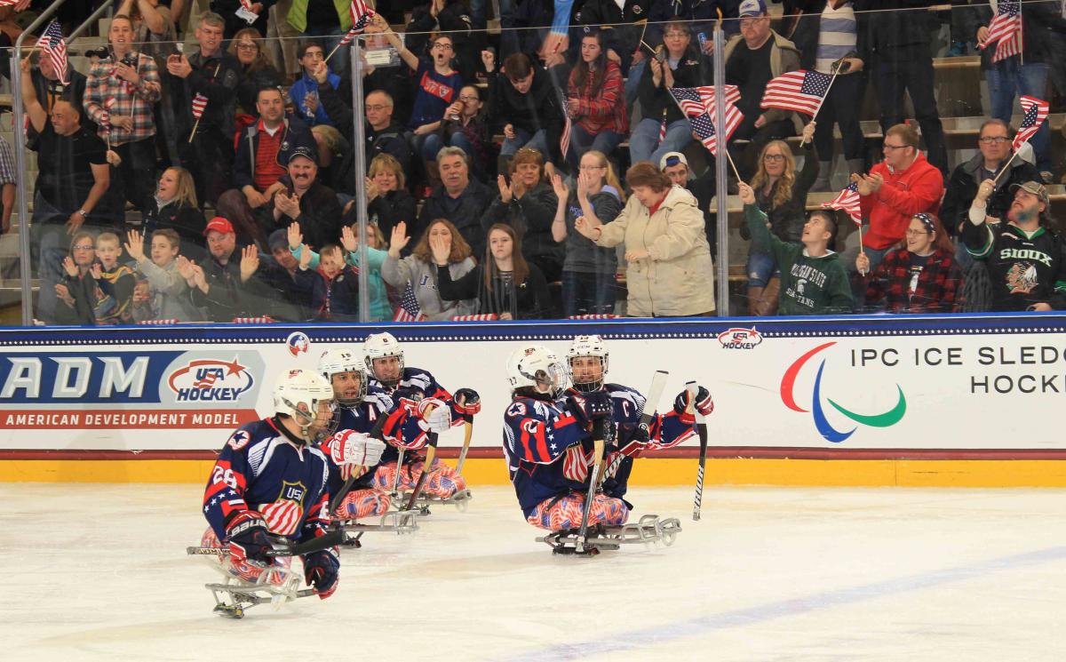 Paul Schaus, Josh Sweeney, Josh Pauls, Nikko Landeros, Luke McDermott compete at the 2015 IPC Ice Sledge Hockey World Championships A-Pool in Buffalo, USA.