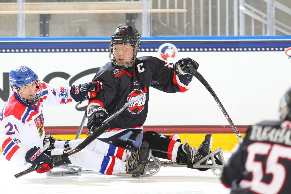 Satoru Sudo, Kazuhiro Takahashi, Pavel Kubes - Czech Republic vs Japan - 2015 IPC Ice Sledge Hockey World Championships Ice sledge hockey players in action on the ice