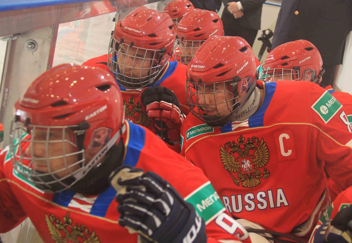 Dmitrii Lisov - Russia vs Italy - 2015 IPC Ice Sledge Hockey World Championships Group of ice sledge hockey players
