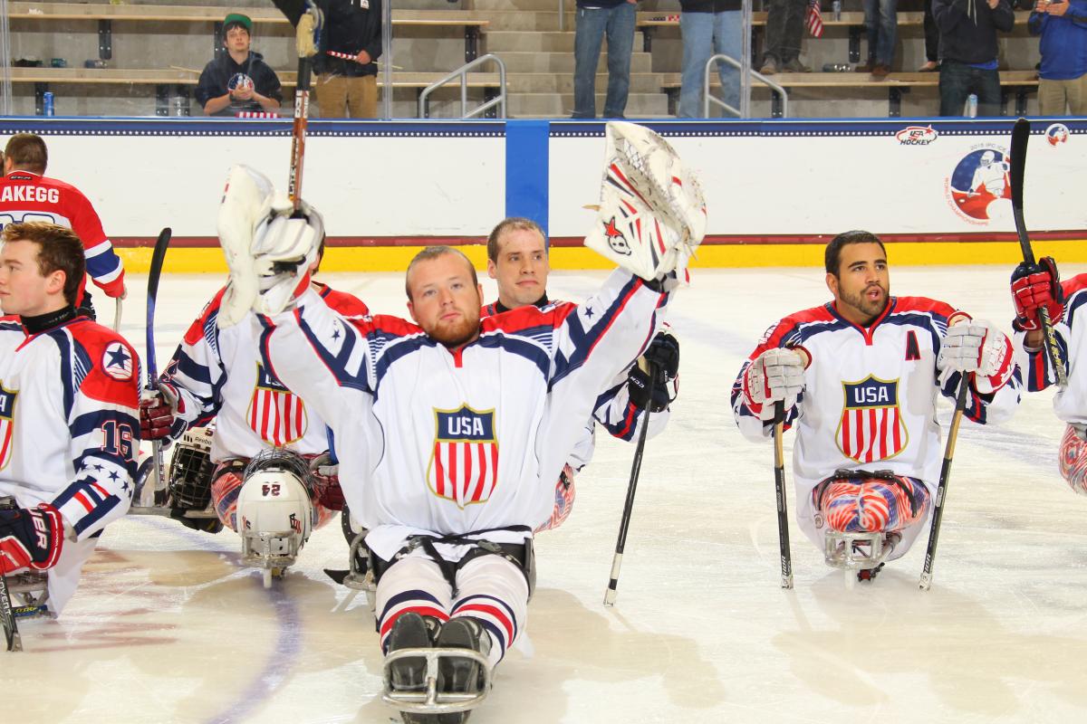 USA v Norway - 2015 IPC Ice Sledge Hockey World Championships Buffalo Sledge hockey players on the ice without their helmets, celebrating