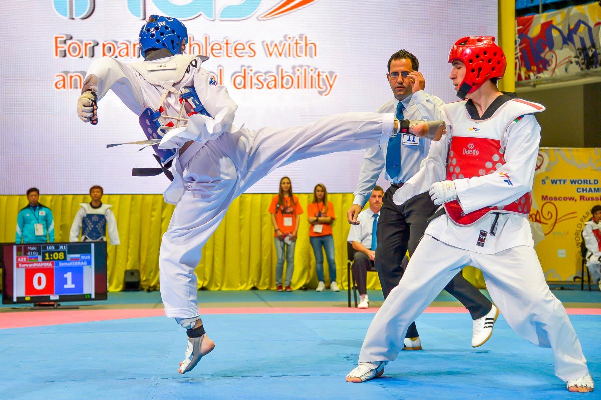 Two athletes doing taekwondo