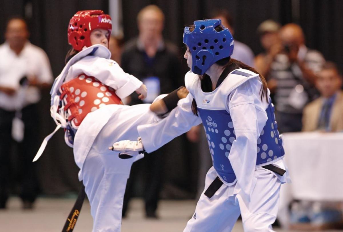Taekwondo Two athletes doing taekwondo