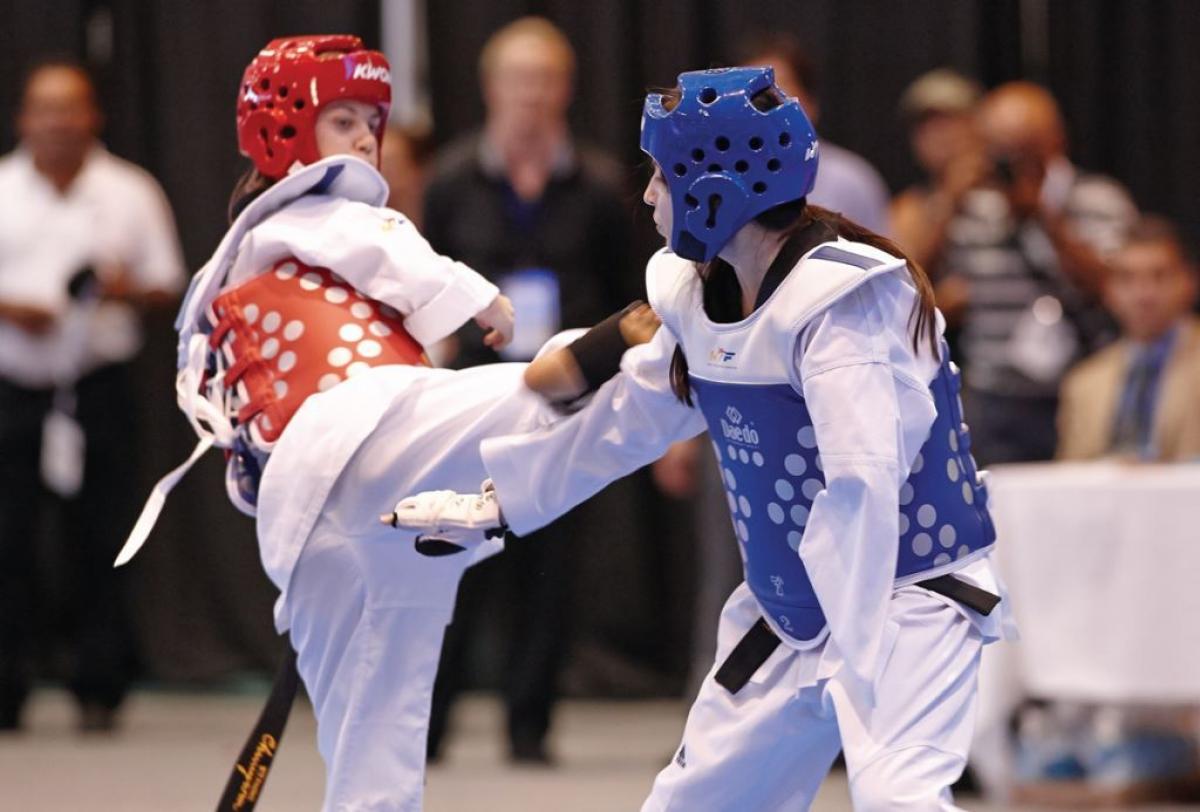 Two athletes doing taekwondo