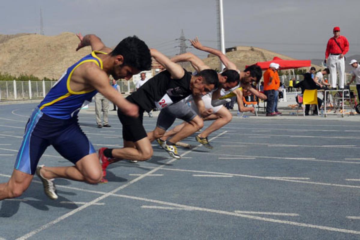 Iran athletes take off during a race in the Iran National Para-Athletics Championships.