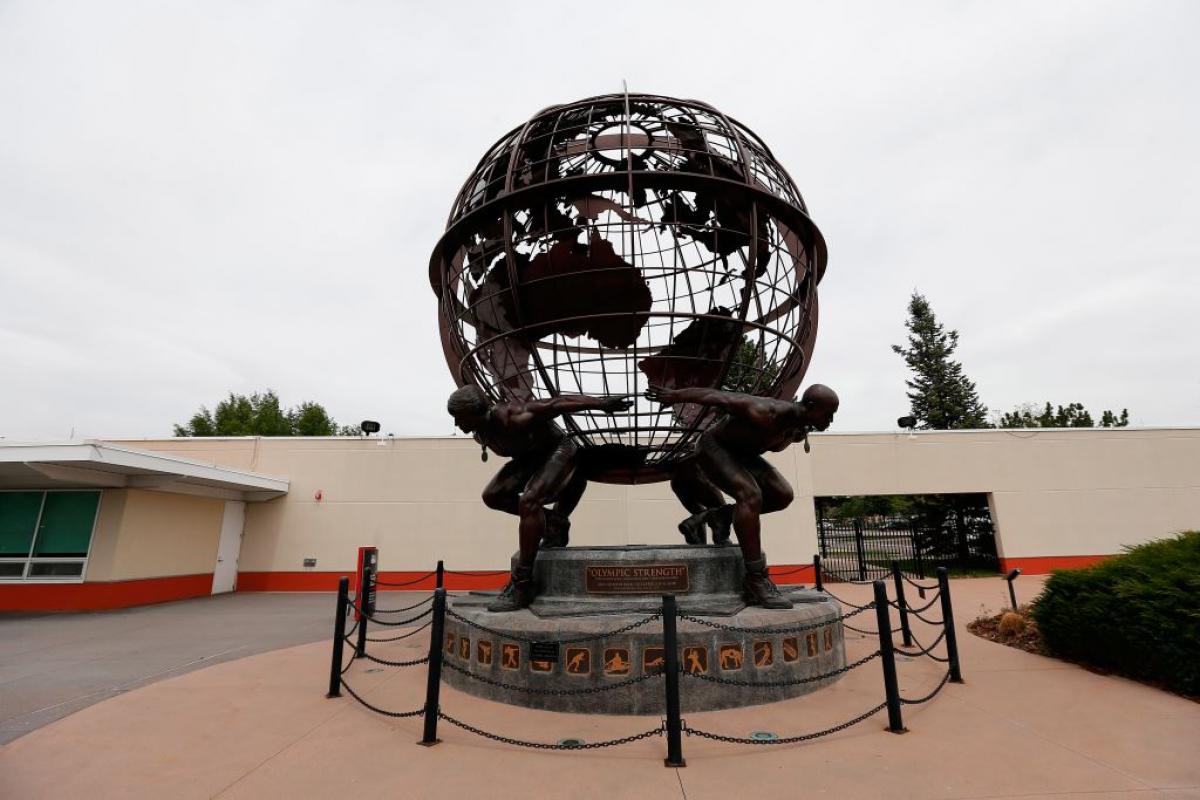 USOC Colorado Springs Sculpture showing a golbus held by four people