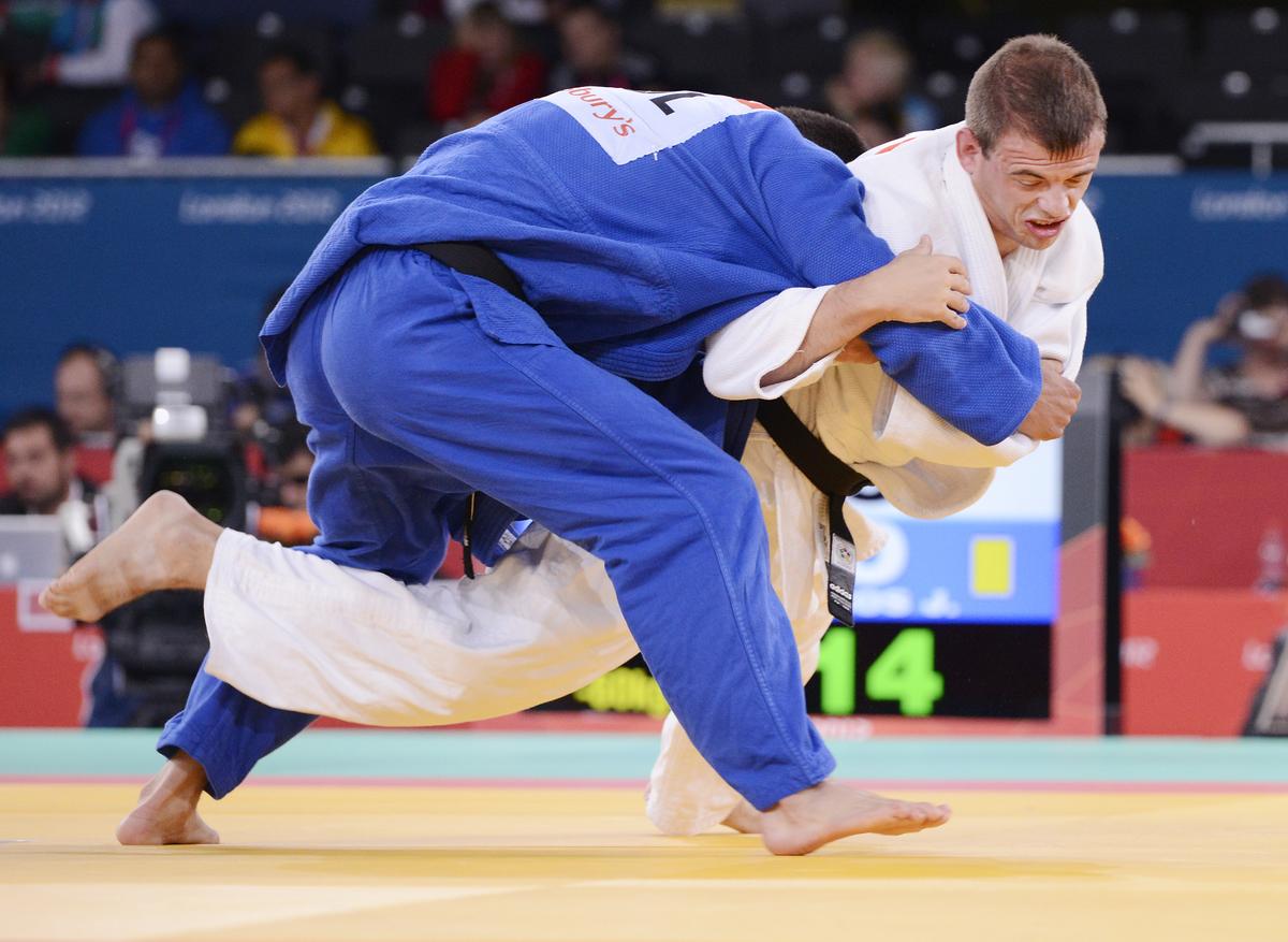 Two judoka competiting. 