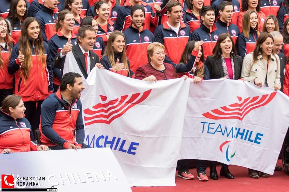 Michelle Bachelet, the President of Chile, with athletes.