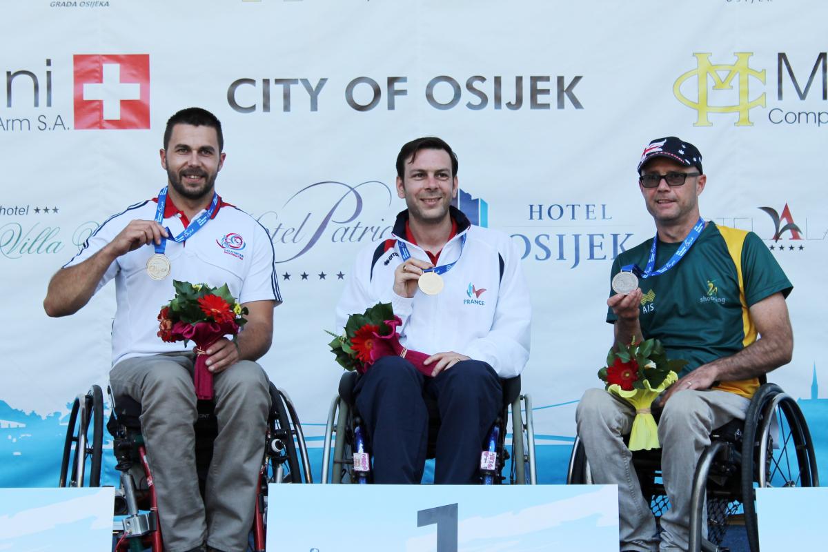 R2 podium Osijek Croatia, Tanche, Skelhon, Zapelli Three shooters display their medals at an IPC Shooting World Cup