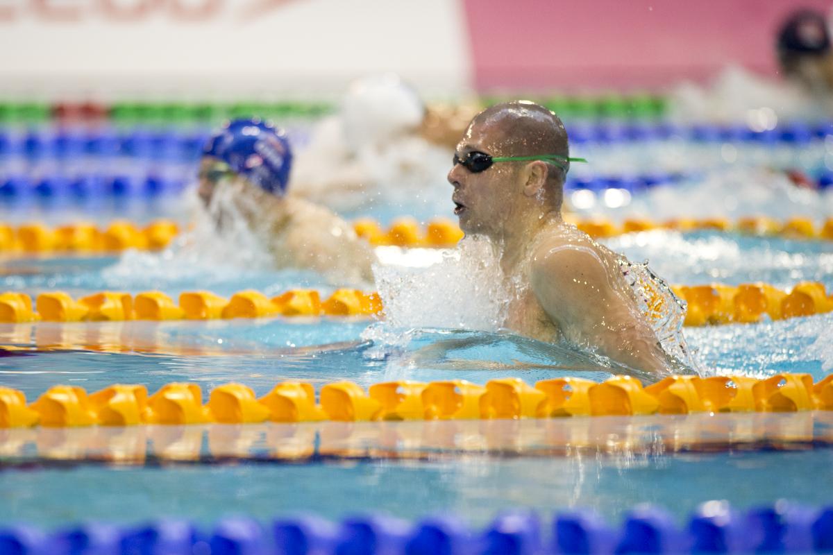 Marc Evers and Scott Quin competing in the Men's 100m Breaststroke SB14 at the 2015 IPC Swimming World Championships in Glasgow