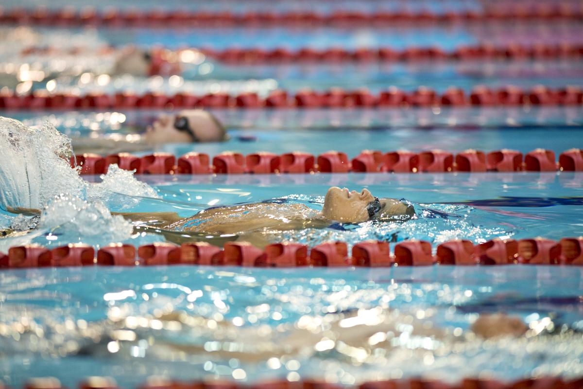 Swimmers doing backstroke