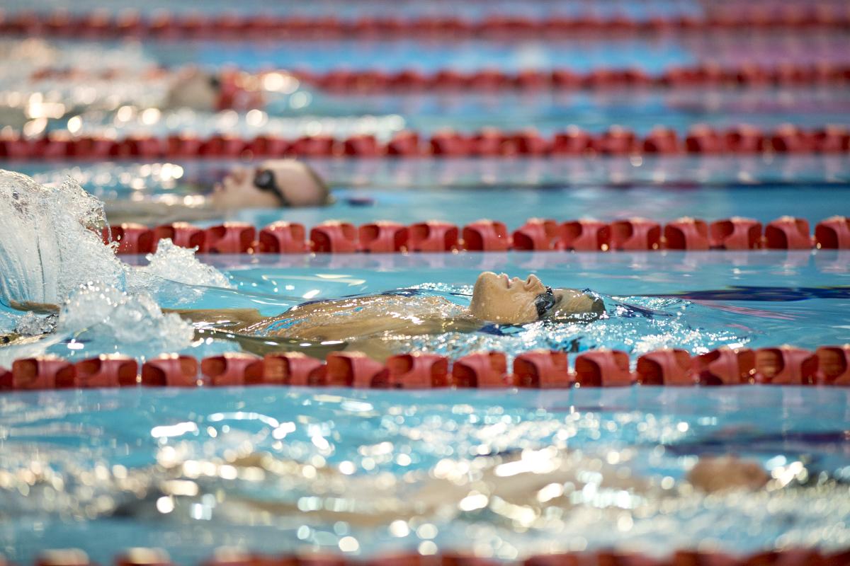 Dmitrii Kokarev - 2015 IPC Swimming World Championships in Glasgow Swimmers doing backstroke