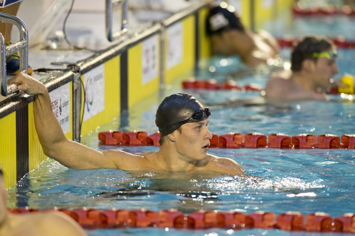 A intellectually impaired swimmer finishes a race