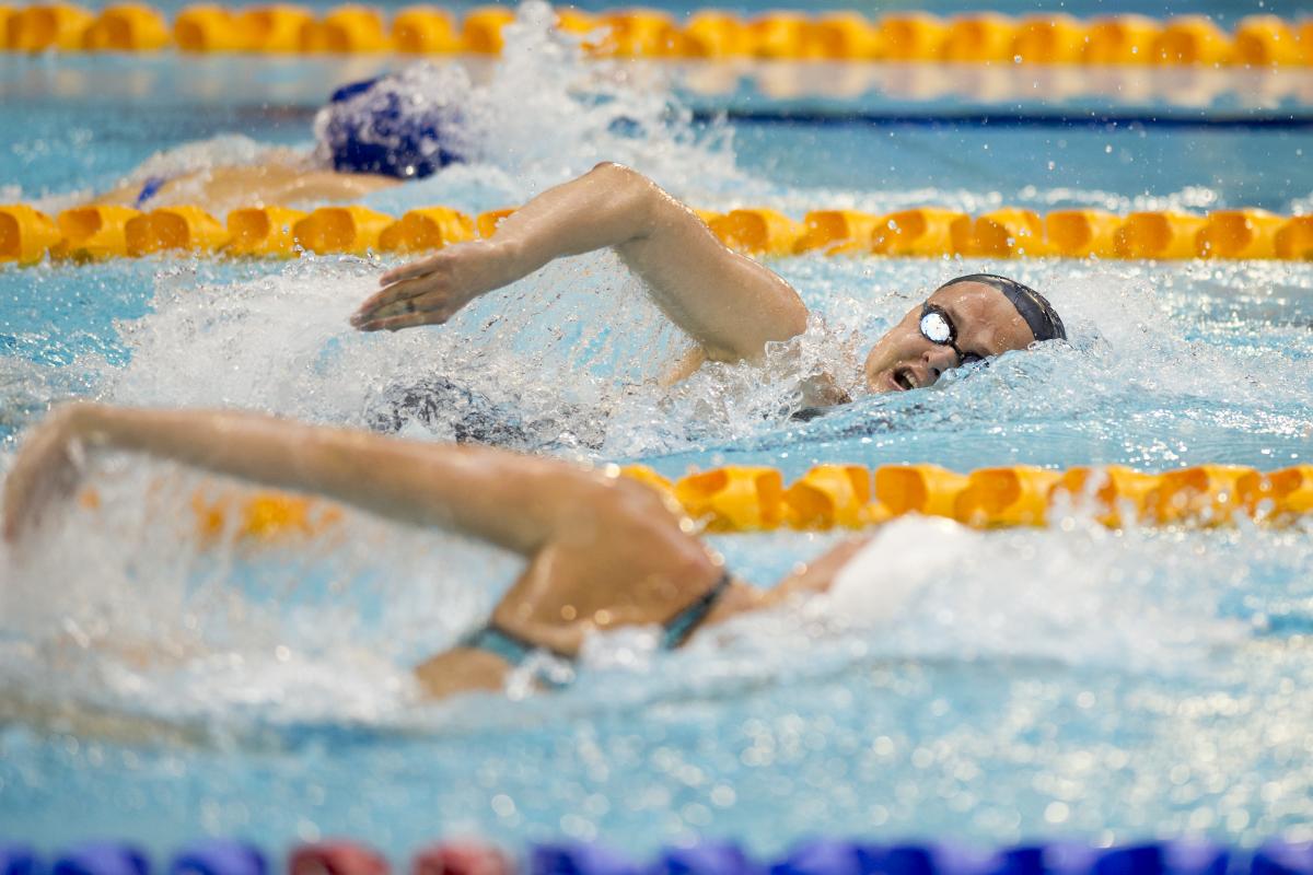 Swimmers doing freestyle