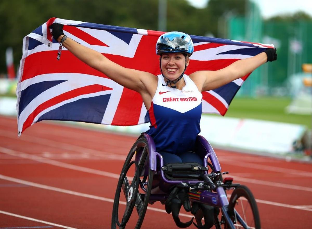 Hannah Cockroft of Great Britain celebrates after winning the womens 800m T34 final during day four of the IPC Athletics European Championships in Swansea.