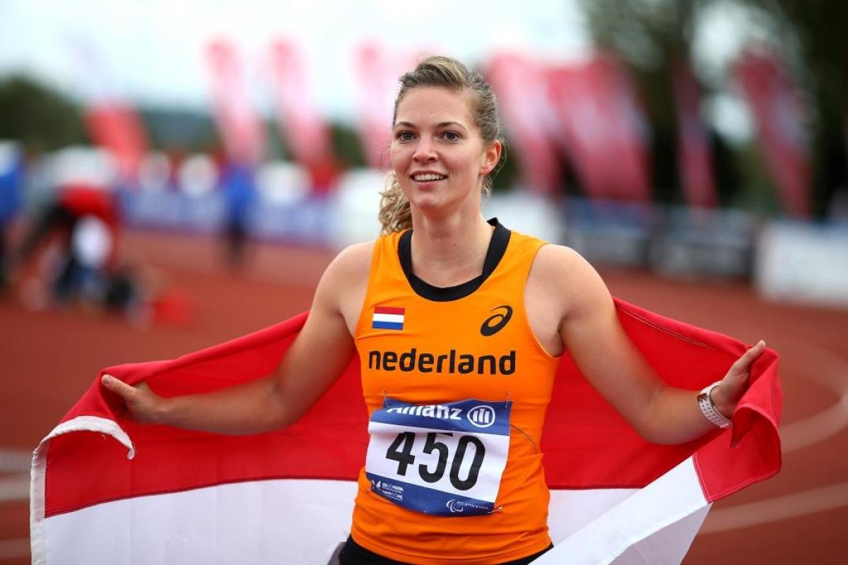 Marlou van Rhijn celebrates after winning the womens 200m T44 final during day three of the IPC Athletics European Championships at Swansea